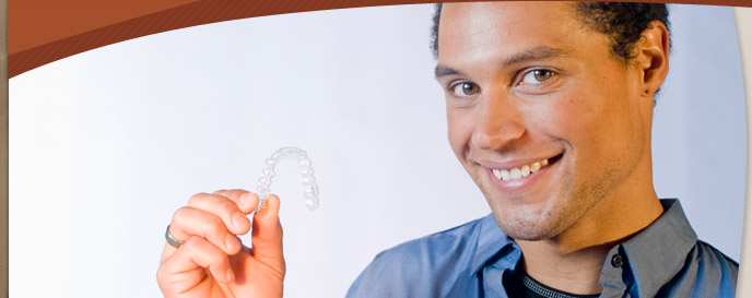 photo of man with invisalign appliance