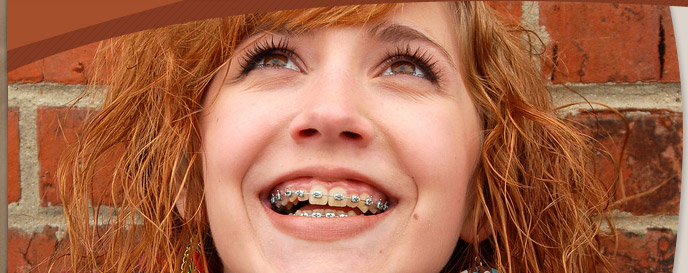 teen girl smiling and wearing braces