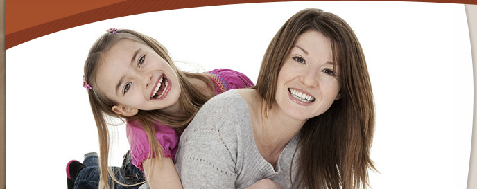 woman and girl smiling