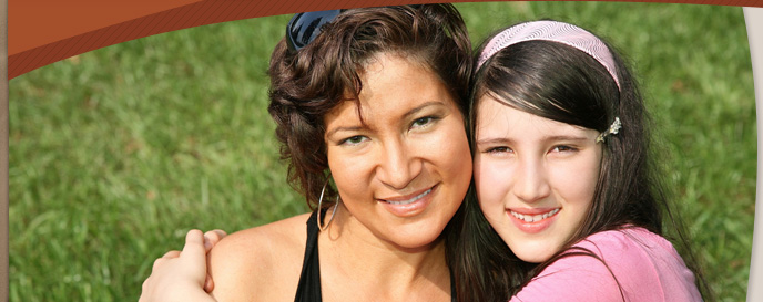 woman and girls smiling